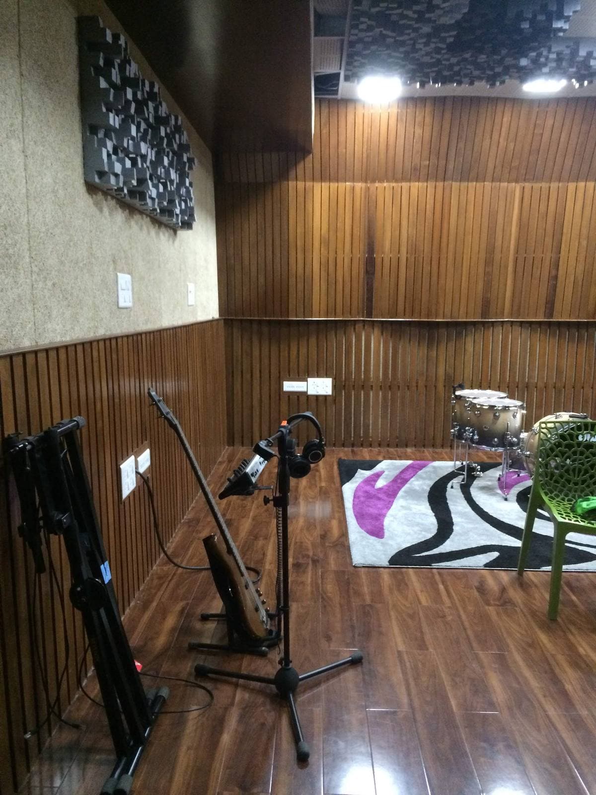 Recording Studio Naharlagun — live room corner with timber-slat absorption and modular foam diffusion